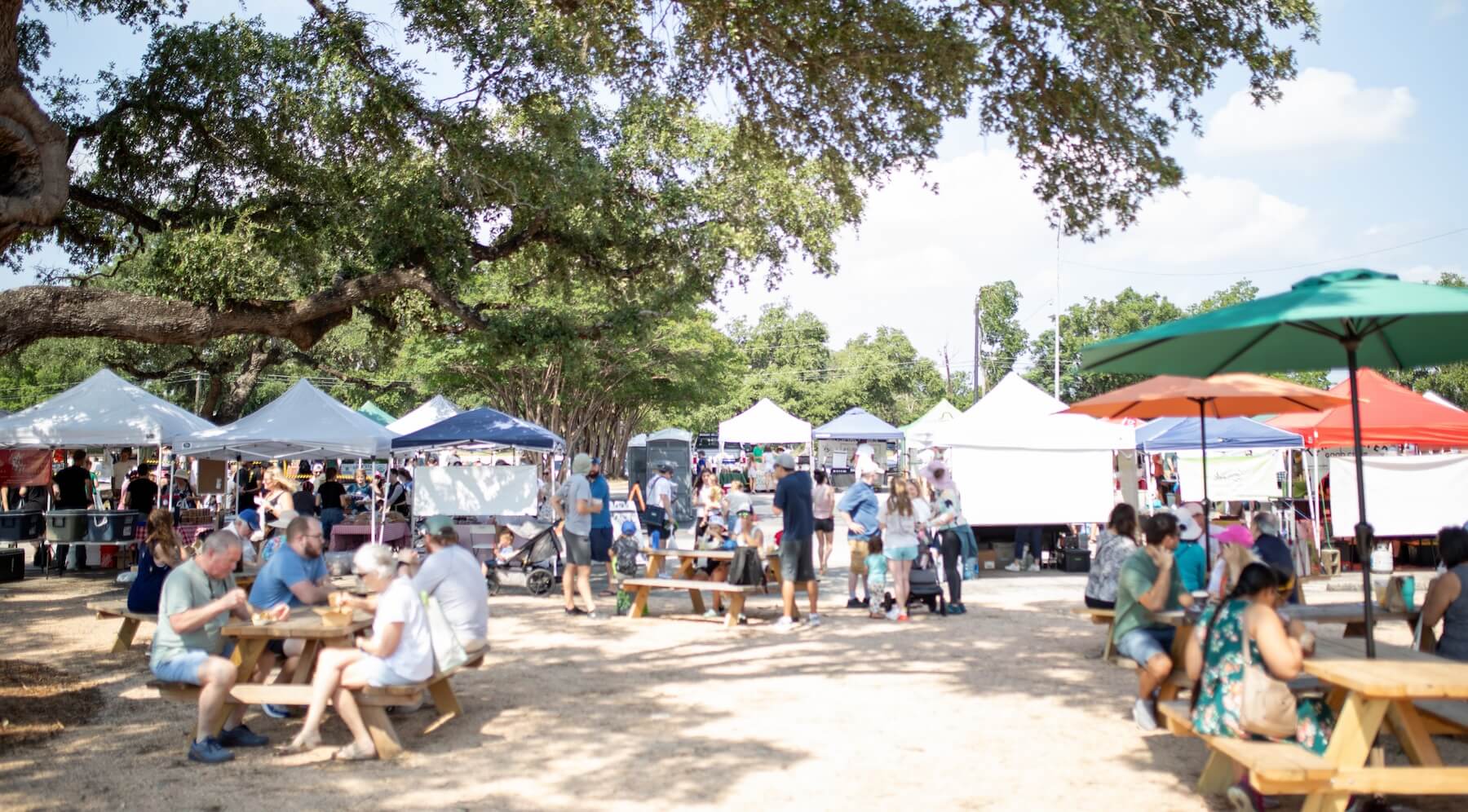 Texas Farmers Market visitors at tables